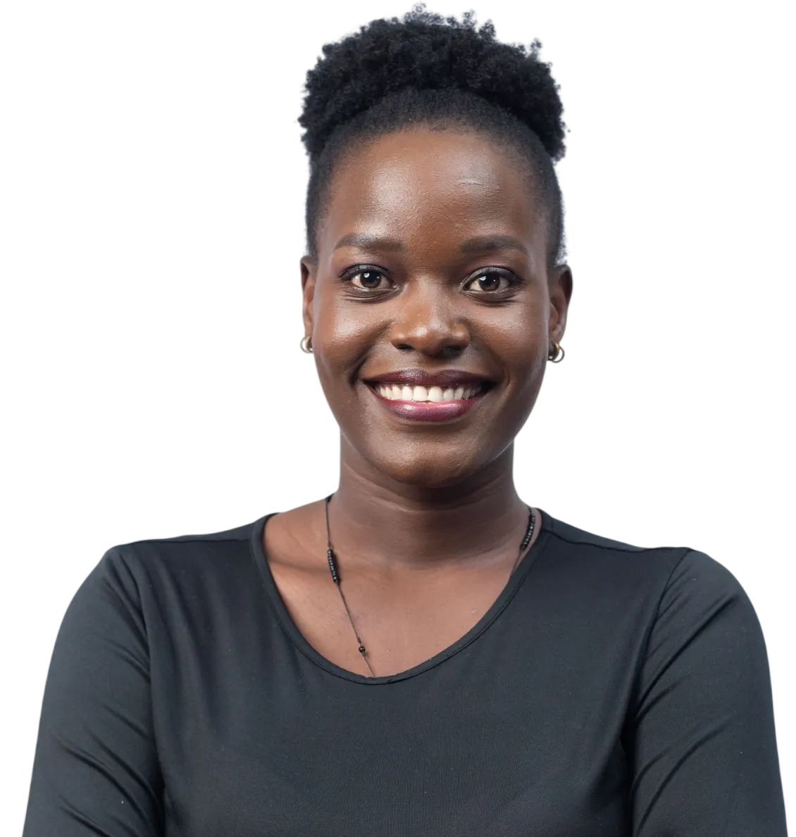 A woman with folded arms, smiling.