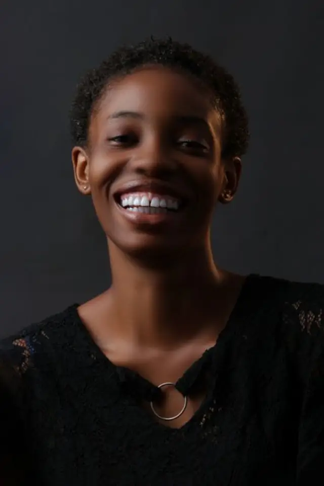 Smiling portrait of Adaeze, a Coffer user in Lagos.